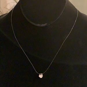 Crystal heart pendant on filament